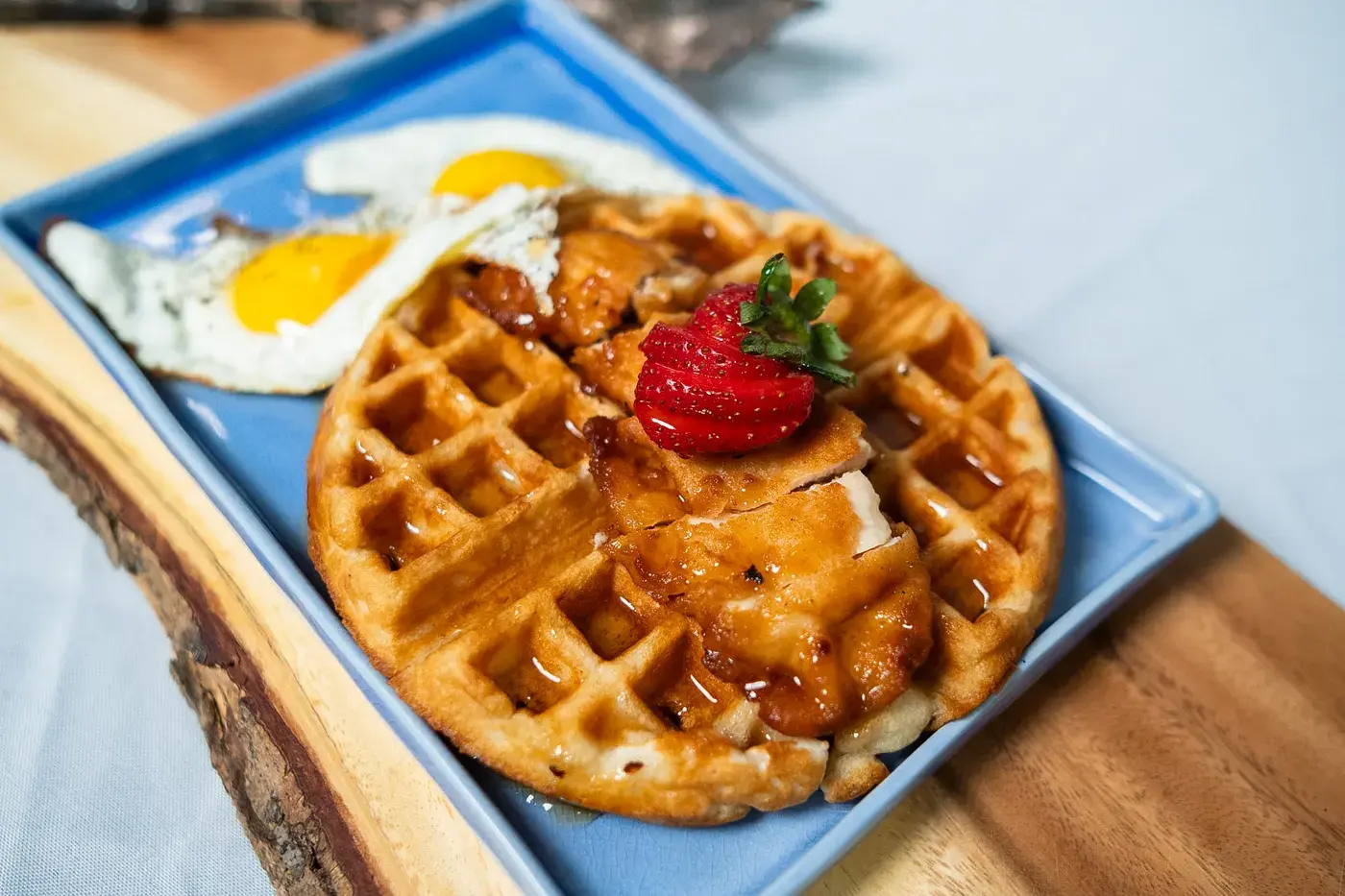Chef Gerry plated dish on a wooden serving board